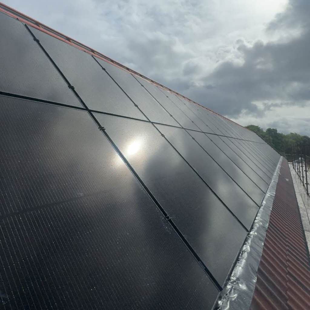 Completed commercial solar panel installation. Completed commercial solar panel installation.