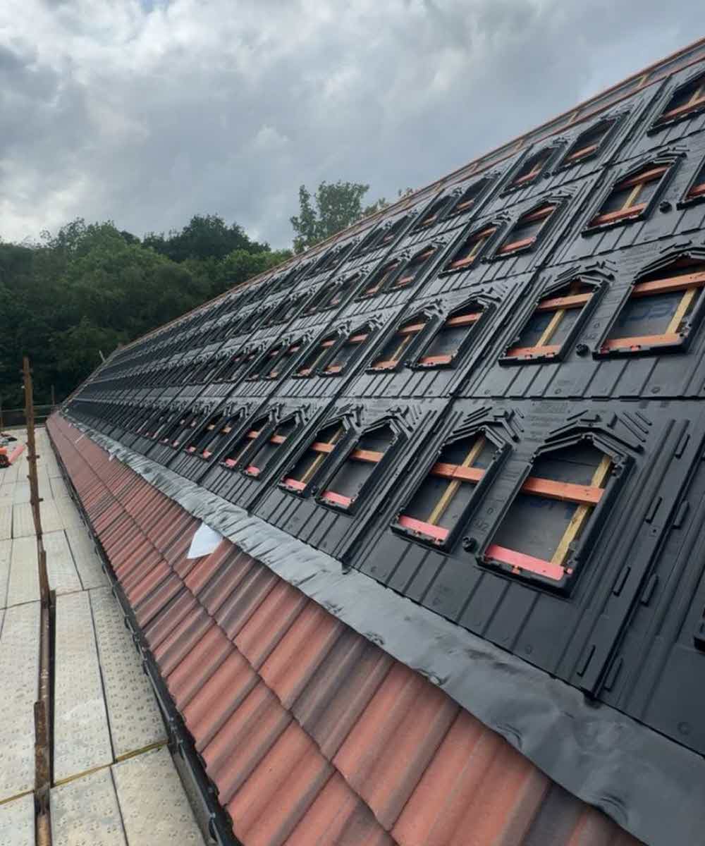 Trays fitted and flashing prepared before installing the 'in roof' solar panels.