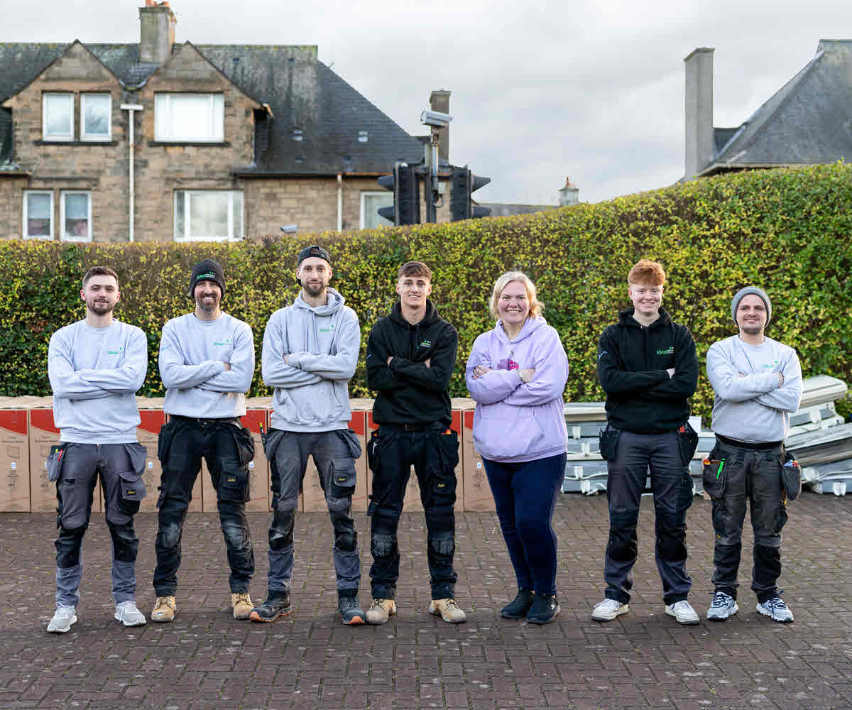 IES electricians with Hazel on the morning of the storage heating intsallation.